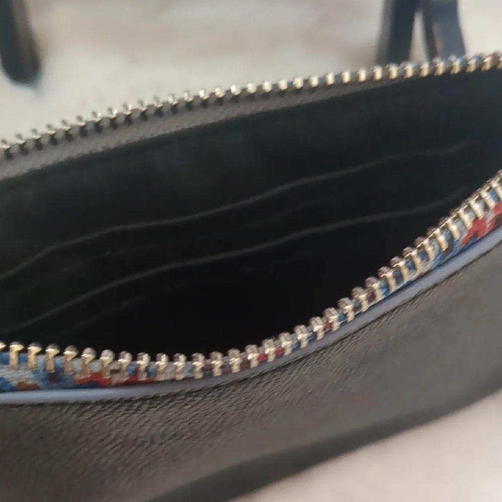 Coach Corner Zip Wristlet Black Crossgrain Leather Floral Trim Strap